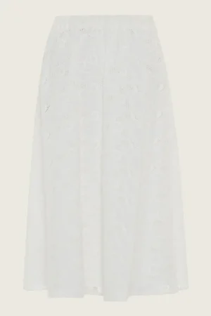دامن خامه دوزی شده سفید رنگ adl دارای جیب بغل قد تا زیر زانو نمای پشت دامن