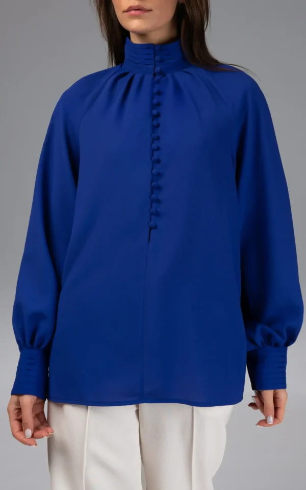 بلوز زنانه آستین مچی و بلند آبی رنگ و طرح یقه اسکی نوادو ۱