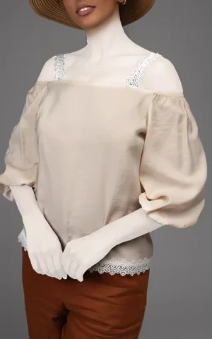 نمای رو به رو تاپ زنانه رنگ کرم آستین سه ربع نوادو