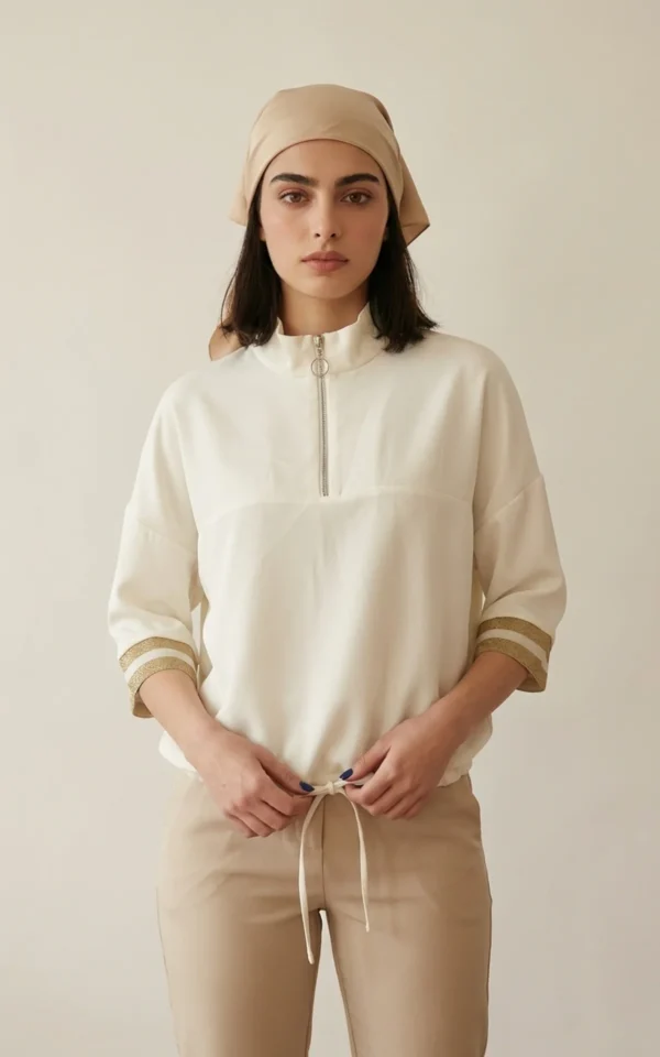 بلوز زنانه شیری‌رنگ با یقه ایستاده زیپ‌دار نوادو کد 404112321757 - Image 2